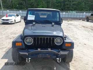 2002 Jeep Wrangler Sport with VIN 1J4FA49S32P700831, listed as a IAAI auction lot 42626269 with 182,870 mi miles and . Bid and sale history available at DreamBid. Image 6.