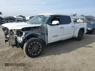 2022 Toyota Tundra Limited Hybrid with VIN 5TFJC5EC4NX001310, listed as a Copart auction lot 87304974 with 70,641 mi miles and Salvage title. Bid and sale history available at DreamBid. Image 1.