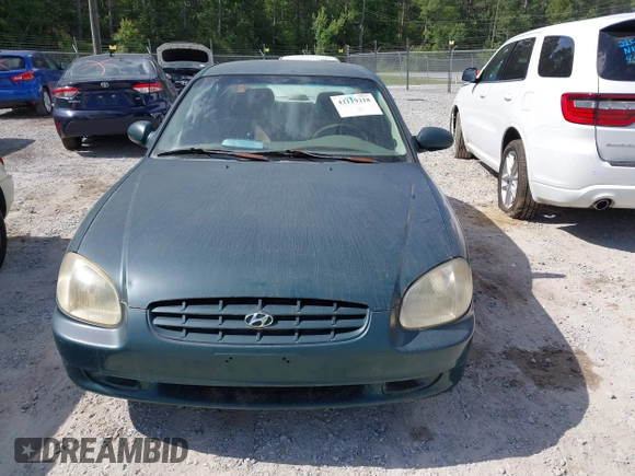 1999 Hyundai Sonata GLS with VIN KMHWF35V6XA107973, listed as a IAAI auction lot 42119318 with 174,231 mi miles. Bid and sale history available at carsss.com. Image 6.