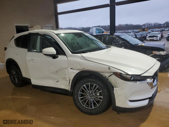 2019 Mazda CX-5 Touring with VIN JM3KFACM6K1608461, listed as a Copart auction lot 45063465 with 64,988 mi miles and Non Repairable. Bid and sale history available at carsss.com. Image 4.