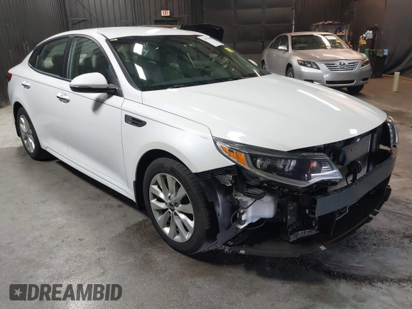 2018 Kia Optima LX z VIN 5XXGT4L34JG252028, wystawiony jako IAAI lot #41979909 z przebiegiem 90 113 mil mil oraz . Historia ofert i sprzedaży dostępna na DreamBid. Obrazek 1.