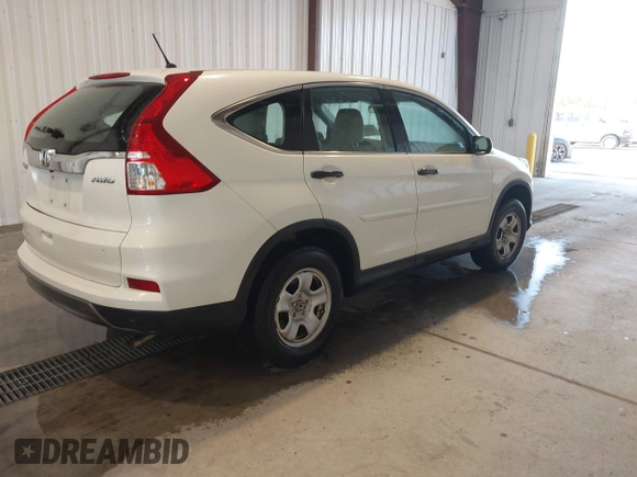2015 Honda CR-V LX with VIN 5J6RM4H36FL005268, listed as a IAAI auction lot 42101431 with 179,411 mi miles and . Bid and sale history available at DreamBid. Image 4.