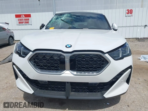 2025 BMW X2 xDrive28i with VIN WBX63GM06S5066386, listed as a IAAI auction lot 41812615 with 1,598 mi miles. Bid and sale history available at carsss.com. Image 12.