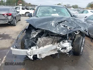 2016 Mercedes-Benz GLC with VIN WDC0G4KB9GF085925, listed as a IAAI auction lot 40804297 with 77,297 mi miles. Bid and sale history available at carsss.com. Image 6.