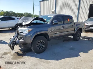 2021 Toyota Tacoma SR5 z VIN 3TYAZ5CNXMT003123, wystawiony jako Copart lot #52740245 z przebiegiem 59 445 mil mil oraz Nie do naprawy • Non repairable. Historia ofert i sprzedaży dostępna na DreamBid. Obrazek 1.