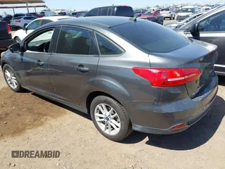 2018 Ford Focus SE with VIN 1FADP3FE6JL270910, listed as a IAAI auction lot 42130371 with 121,240 mi miles. Bid and sale history available at carsss.com. Image 3.
