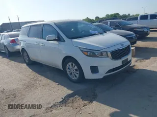 2015 Kia Sedona LX with VIN KNDMB5C10F6027850, listed as a IAAI auction lot 42010344 with 127,019 mi miles. Bid and sale history available at carsss.com. Image 1.