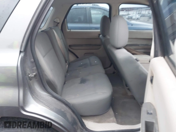 2009 Ford Escape XLS with VIN 1FMCU92769KD15656, listed as a IAAI auction lot 42185560 with 110,792 mi miles and . Bid and sale history available at DreamBid. Image 8.