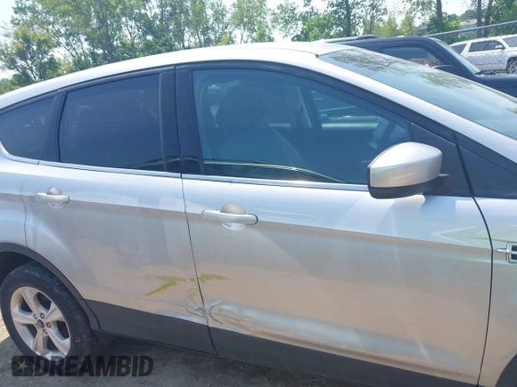2014 Ford Escape SE with VIN 1FMCU9GX3EUC42964, listed as a IAAI auction lot 42484080 with 124,696 mi miles and . Bid and sale history available at DreamBid. Image 13.