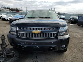 2012 Chevrolet Tahoe LTZ with VIN 1GNSKCE08CR322969, listed as a Copart auction lot 50604555 with 165,190 mi miles and Salvage title. Bid and sale history available at DreamBid. Image 5.