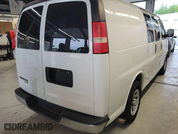 2013 Chevrolet Express Cargo with VIN 1GCSGAFX5D1110945, listed as a IAAI auction lot 42635460 with 239,048 mi miles and . Bid and sale history available at DreamBid. Image 33.