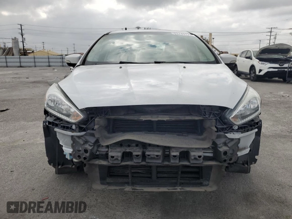 2017 Ford Focus SE with VIN 1FADP3F27HL217567, listed as a Copart auction lot 53749175 with 62,727 mi miles and Salvage title. Bid and sale history available at DreamBid. Image 5.