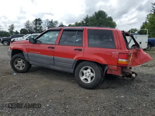 1997 Jeep Grand Cherokee Laredo with VIN 1J4GZ58S8VC601342, listed as a Copart auction lot 65360204 with 139,036 mi miles and Salvage Title. Bid and sale history available at carsss.com. Image 2.