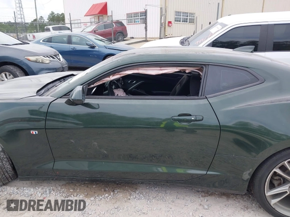 2020 Chevrolet Camaro 1LT with VIN 1G1FB1RS6L0125323, listed as a IAAI auction lot 42101034 with 124,474 mi miles and . Bid and sale history available at DreamBid. Image 14.