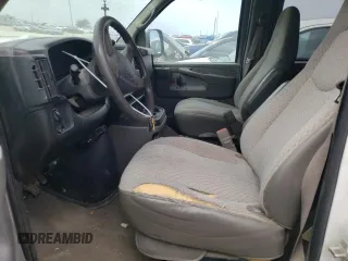 2005 Chevrolet Express Passenger with VIN 1GAHG39U051232615, listed as a Copart auction lot 73574264 with 207,303 mi miles and Salvage title. Bid and sale history available at DreamBid. Image 7.