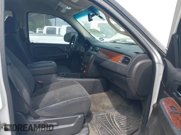 2007 Chevrolet Tahoe LT z VIN 1GNFC13027R112945, wystawiony jako IAAI lot #42178102 z przebiegiem 202 858 mil mil oraz . Historia ofert i sprzedaży dostępna na DreamBid. Obrazek 5.