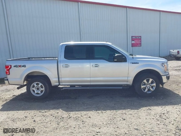 2018 Ford F-150 XL with VIN 1FTEW1EG2JFE36699, listed as a IAAI auction lot 41842524 with 152,813 mi miles. Bid and sale history available at carsss.com. Image 13.