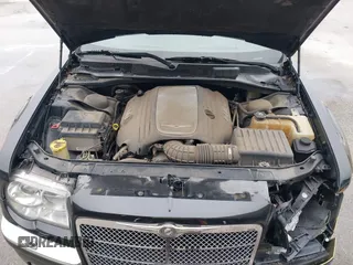 2005 Chrysler 300 with VIN 2C3AA63H45H674987, listed as a IAAI auction lot 41560730 with 101,659 mi miles. Bid and sale history available at carsss.com. Image 10.