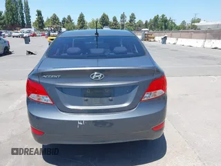 2013 Hyundai Accent GLS z VIN KMHCU4AE9DU427450, wystawiony jako IAAI lot #42415750 z przebiegiem 105 890 mil mil oraz . Historia ofert i sprzedaży dostępna na DreamBid. Obrazek 15.