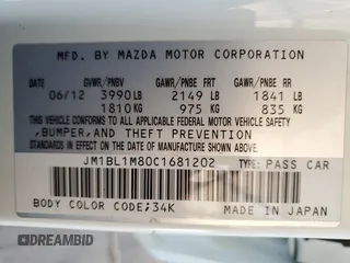 2012 Mazda 3 i Grand Touring с VIN JM1BL1M80C1681202, выставлен на аукционе Copart как лот 56425725 с пробегом 112 311 миль миль и Списание • Salvage title. История ставок и продаж доступна на DreamBid. Изображение 12.