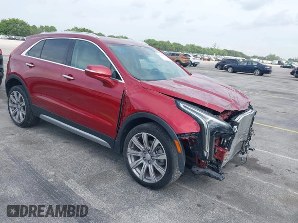 2021 Cadillac XT4 FWD Premium Luxury with VIN 1GYFZCR41MF043072, listed as a IAAI auction lot 41769251 with 31,053 mi miles. Bid and sale history available at carsss.com. Image 1.