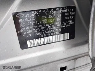 2013 Hyundai Sonata Hybrid with VIN KMHEC4A44DA077276, listed as a IAAI auction lot 41752360 with 62,700 mi miles. Bid and sale history available at carsss.com. Image 9.