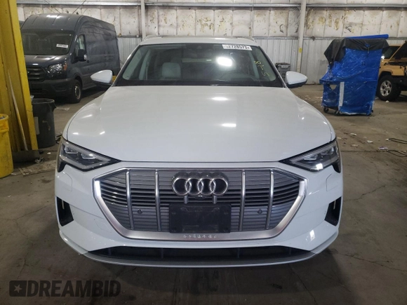 2021 Audi e-tron Prestige with VIN WA1VABGEXMB001869, listed as a Copart auction lot 52728573 with 26,110 mi miles and . Bid and sale history available at DreamBid. Image 5.