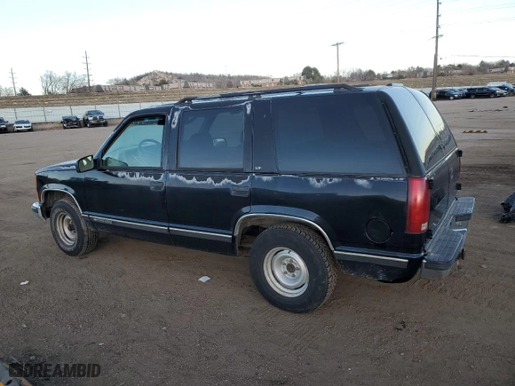 1999 Chevrolet Tahoe with VIN 1GNEC13R4XJ568244, listed as a Copart auction lot 85397504 with 111,327 mi miles and Clean Title. Bid and sale history available at carsss.com. Image 2.