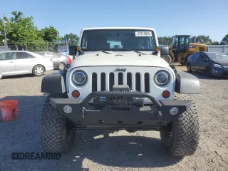 2010 Jeep Wrangler Rubicon with VIN 1J4BA6D18AL221240, listed as a Copart auction lot 57819025 with 78,120 mi miles and Salvage title. Bid and sale history available at DreamBid. Image 5.