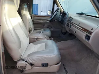 1996 Ford Bronco Custom with VIN 1FMEU15H4TLB59116, listed as a Copart auction lot 52989015 with 210,464 mi miles and Salvage title. Bid and sale history available at DreamBid. Image 7.