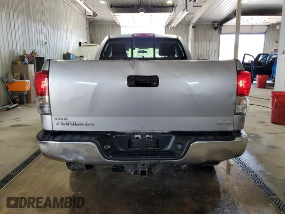 2010 Toyota Tundra с VIN 5TFUM5F11AX006417, выставлен на аукционе Copart как лот 55897725 с пробегом 203 892 миль миль и Списание • Salvage title. История ставок и продаж доступна на DreamBid. Изображение 6.