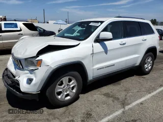 2016 Jeep Grand Cherokee Laredo z VIN 1C4RJEAG2GC445717, wystawiony jako Copart lot #53838055 z przebiegiem 125 128 mil mil oraz Szkoda całkowita • Salvage title. Historia ofert i sprzedaży dostępna na DreamBid. Obrazek 1.