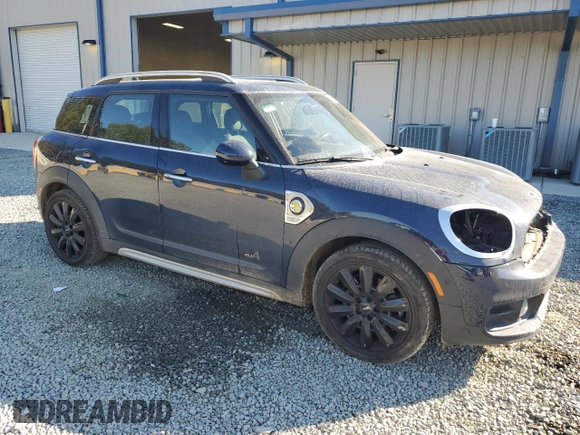 2018 MINI Countryman Cooper S E with VIN WMZYU7C47J3E56451, listed as a Copart auction lot 77193144 with 60,949 mi miles and Salvage Title. Bid and sale history available at carsss.com. Image 4.