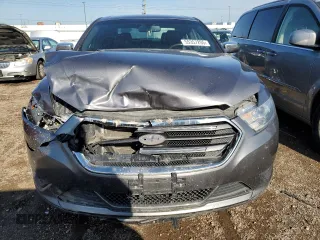 2014 Ford Taurus Limited with VIN 1FAHP2F8XEG163430, listed as a Copart auction lot 55357205 with 150,841 mi miles and Salvage title. Bid and sale history available at DreamBid. Image 5.