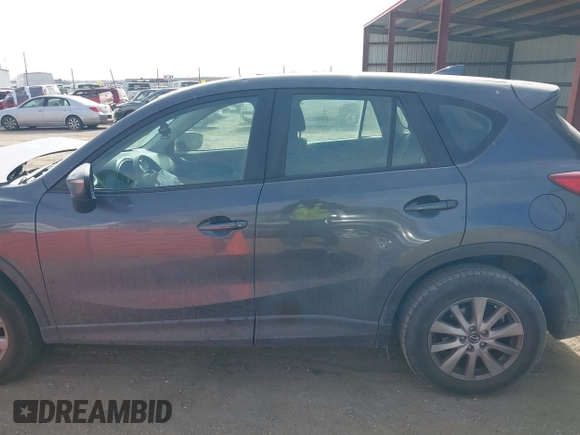 2016 Mazda CX-5 Sport with VIN JM3KE4BY0G0623365, listed as a IAAI auction lot 41525002 with 127,674 mi miles and . Bid and sale history available at carsss.com. Image 14.