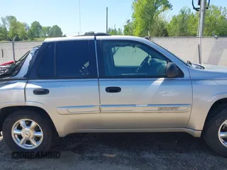 2004 GMC Envoy SLE with VIN 1GKDS13S242420100, listed as a IAAI auction lot 41963800 with 341,395 mi miles and . Bid and sale history available at DreamBid. Image 13.
