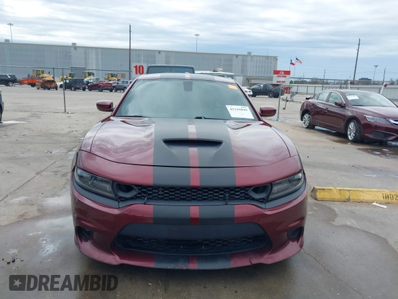 2020 Dodge Charger Scat Pack z VIN 2C3CDXGJ8LH132985, wystawiony jako IAAI lot #41316849 z przebiegiem 66 881 mil mil oraz . Historia ofert i sprzedaży dostępna na DreamBid. Obrazek 12.