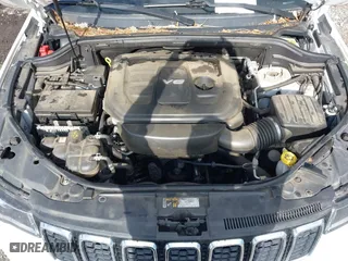 2018 Jeep Grand Cherokee Laredo E with VIN 1C4RJFAG8JC424609, listed as a IAAI auction lot 41124689 with 101,643 mi miles. Bid and sale history available at carsss.com. Image 10.