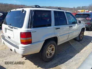 1997 Jeep Grand Cherokee Limited with VIN 1J4GZ78S9VC667698, listed as a IAAI auction lot 41671571 with 191,448 mi miles and . Bid and sale history available at DreamBid. Image 4.