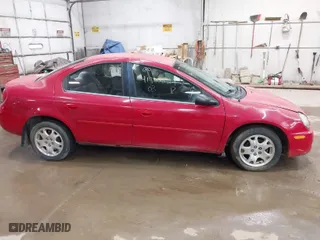 2003 Dodge Neon SXT with VIN 1B3ES56C03D189956, listed as a IAAI auction lot 41962824 with 51,872 mi miles. Bid and sale history available at carsss.com. Image 13.