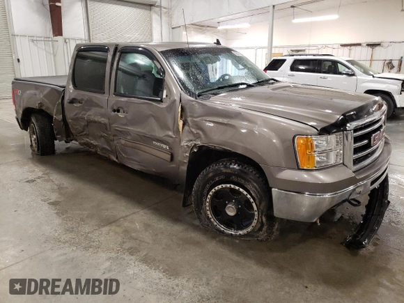 2012 GMC Sierra 1500 SLE with VIN 3GTP2VE73CG227453, listed as a Copart auction lot 52871865 with 133,419 mi miles and Salvage Title. Bid and sale history available at DreamBid. Image 4.