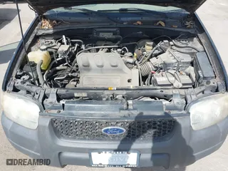 2003 Ford Escape XLS Popular with VIN 1FMYU02153KB46301, listed as a IAAI auction lot 41793418 with 188,184 mi miles. Bid and sale history available at carsss.com. Image 10.