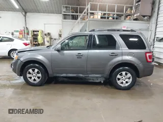 2010 Ford Escape Limited z VIN 1FMCU9EG2AKC17658, wystawiony jako IAAI lot #42430110 z przebiegiem 143 964 mil mil oraz . Historia ofert i sprzedaży dostępna na DreamBid. Obrazek 14.