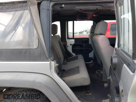 2008 Jeep Wrangler Unlimited X with VIN 1J4GA39198L651172, listed as a IAAI auction lot 41936521 with 69,007 mi miles and . Bid and sale history available at DreamBid. Image 8.