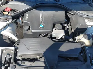 2014 BMW 3 Series 320i with VIN WBA3B1C59EP678908, listed as a IAAI auction lot 41774738 with 143,975 mi miles. Bid and sale history available at carsss.com. Image 10.