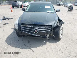 2014 Cadillac ATS Standard AWD z VIN 1G6AG5RX2E0119868, wystawiony jako IAAI lot #42095166 z przebiegiem 113 151 mil mil oraz . Historia ofert i sprzedaży dostępna na DreamBid. Obrazek 6.