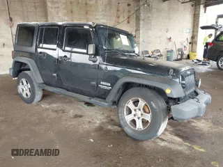 2015 Jeep Wrangler Unlimited Willys Wheeler with VIN 1C4BJWDG9FL652607, listed as a IAAI auction lot 41836193 with 166,152 mi miles and . Bid and sale history available at DreamBid. Image 1.