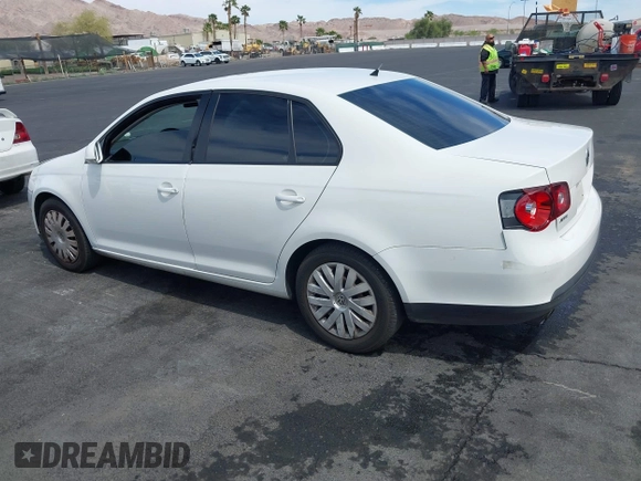 2010 Volkswagen Jetta Sedan S with VIN 3VWJZ7AJ9AM037277, listed as a IAAI auction lot 42044404 with 129,823 mi miles. Bid and sale history available at carsss.com. Image 3.