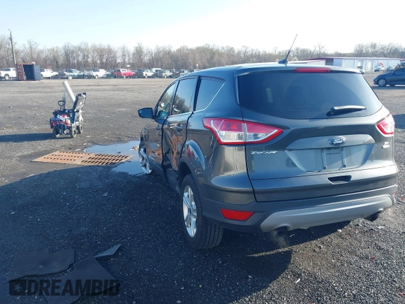 2016 Ford Escape SE with VIN 1FMCU9GX1GUB67636, listed as a IAAI auction lot 41929725 with 68,297 mi miles. Bid and sale history available at carsss.com. Image 3.