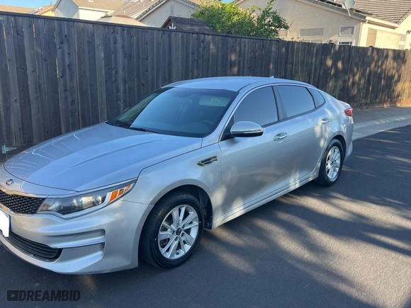 2016 Kia Optima LX with VIN 5XXGT4L38GG022940, listed as a Copart auction lot 54086785 with 145,038 mi miles and Clean Title. Bid and sale history available at carsss.com. Image 2.